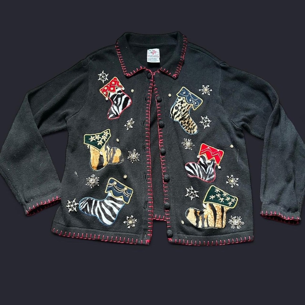 Knit Black Christmas sweater with animal, print stockings #uglychristmassweater